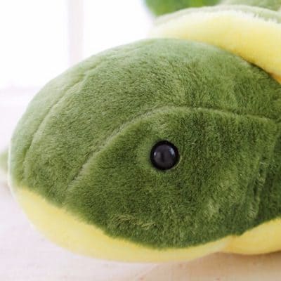 tete de tortue verte en peluche