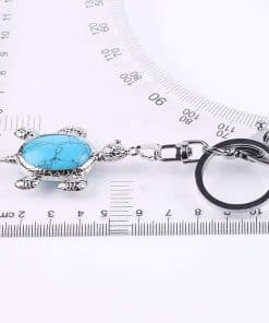 longueur de porte cle tortue sur une regle