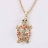 Pendentif tortue avec petits strass rose