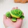 Porte-cles tortue cuir veritable metal argente